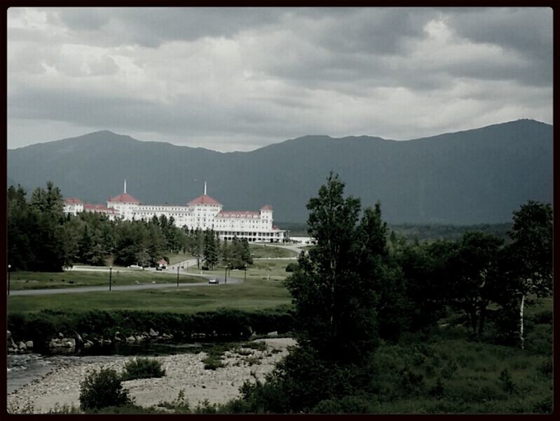 mountain, architecture, built structure, building exterior, sky, transfer print, mountain range, tree, house, auto post production filter, cloud - sky, landscape, cloud, tranquil scene, tranquility, scenics, grass, nature, beauty in nature, water