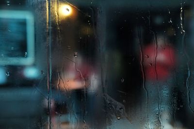 Full frame shot of wet glass window