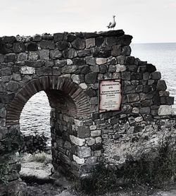 Old stone wall against sky