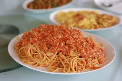 Close-up of noodles in bowl on table