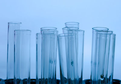 Close-up of glass against blue background