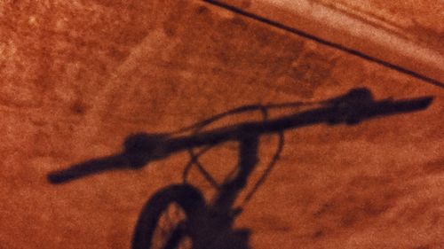 Close-up of bicycle on road