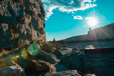 Panoramic view of sea and rocks against sky