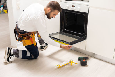 High angle view of man working at home