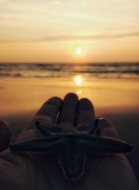 Low section of person on beach