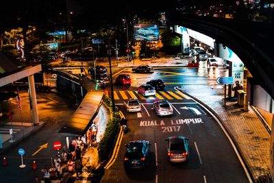 High angle view of traffic on city street at night