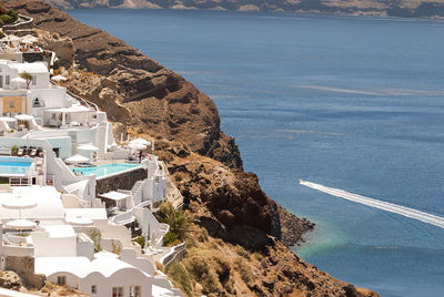 High angle view of oia village by sea at santorini