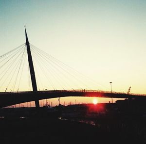 Suspension bridge at sunset