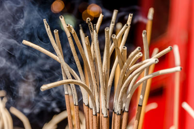 Close-up of sticks in row