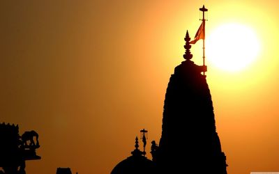 Silhouette of temple against sky during sunset