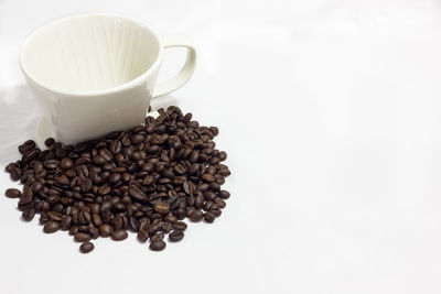 Close-up of coffee beans on table