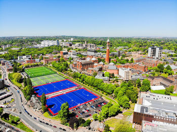 High angle view of townscape against clear blue sky