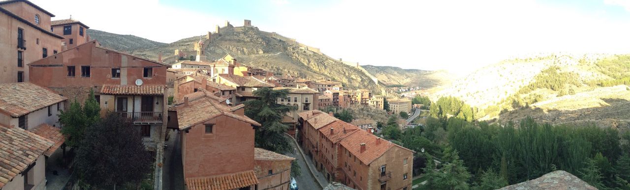 architecture, mountain, building exterior, built structure, day, house, outdoors, no people, sky, nature, mountain range