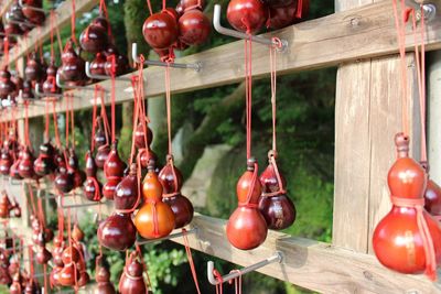 Close-up of red object hanging on wall