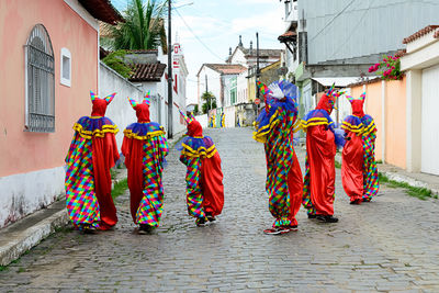 Group of people wearing venice carnival costumes during the carnival 