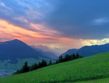 Scenic view of landscape against sky during sunset