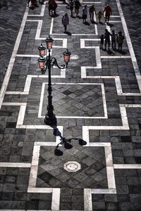 High angle view of people walking on street