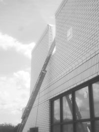 Low angle view of modern building against sky