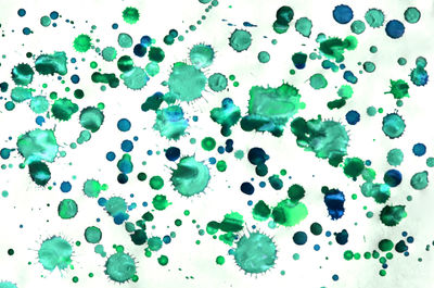 Close-up of water drops on white background