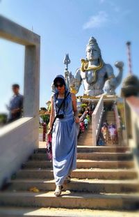 Woman sitting in a temple