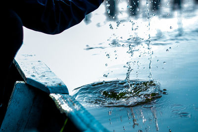 Close-up of hand holding water