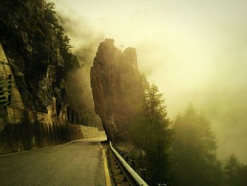 Road passing through trees