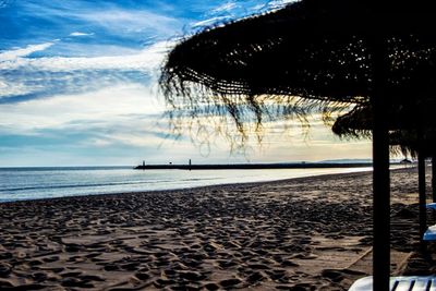 Scenic view of beach against sky