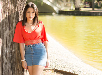 Model woman looking at camera during outdoors session