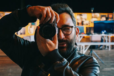 Portrait of man photographing