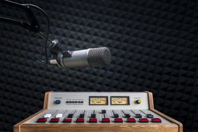 Professional microphone and sound mixer in studio