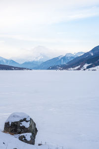 Scenic view of snowcapped mountains against sky