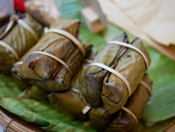 Close-up of shells for sale at market stall