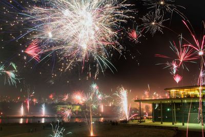 Firework display at night