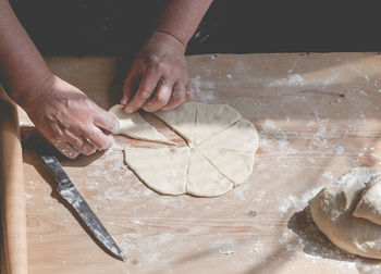 Close-up of person preparing food