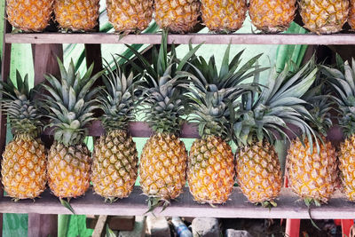 Close-up of pineapples for sale in market