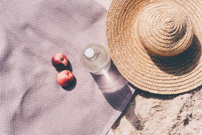 Water bottles and peaches fruit snack at the beach