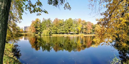 Scenic view of lake against sky during autumn