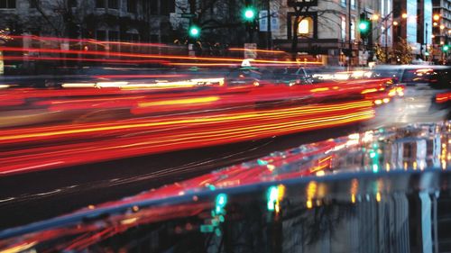 Blurred motion of car on road at night