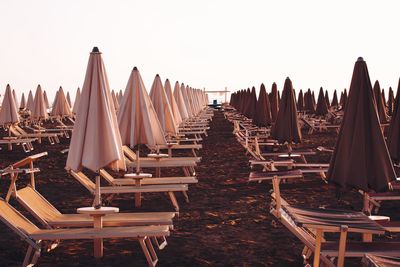 Panoramic shot of chairs against clear sky