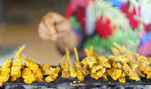 Close-up of hand holding vegetables