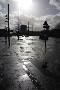 Wet shore against sky