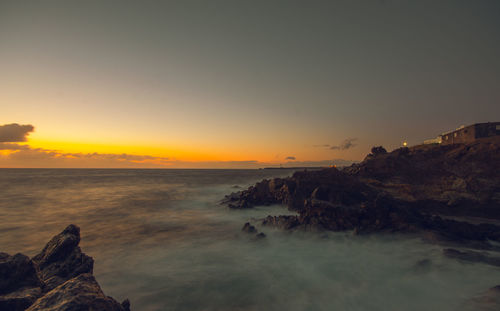 Scenic view of sea against sky during sunset