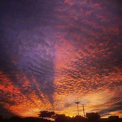 Low angle view of cloudy sky at sunset