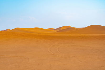 Scenic view of desert against sky