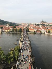 High angle view of people walking on charles bridge