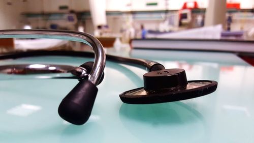 Close-up of stethoscope on table in clinic