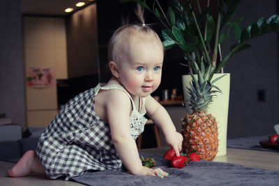 Cute girl sitting at home