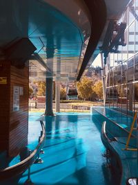 Reflection of swimming pool in city