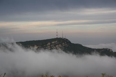 Scenic view of mountains against sky during sunset