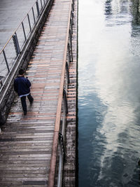 Rear view of man on water